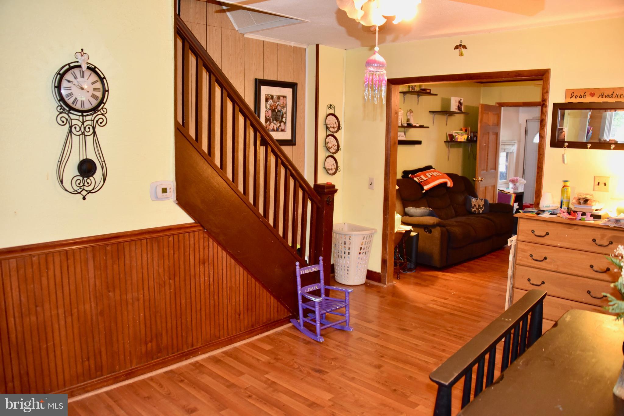 1101 Mount Laurel Road Temple, PA 19560 - Photo 7 of 14 Dining Room, beautiful wood staircase