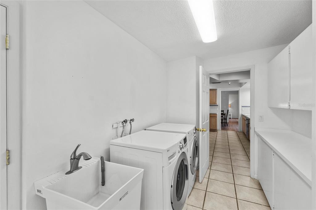 433 Whitfield Avenue Sarasota, FL 34243 - Photo 39 of 46 a utility room with dryer and washer