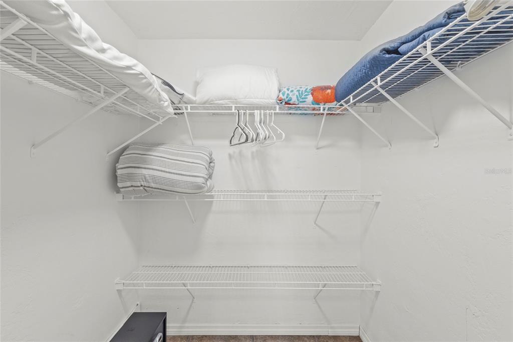 433 Whitfield Avenue Sarasota, FL 34243 - Photo 41 of 46 a view of walk in closet