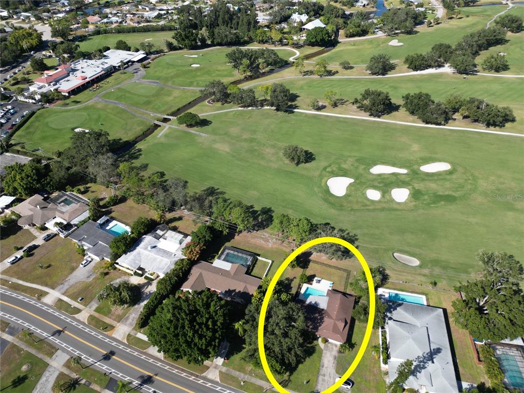 433 Whitfield Avenue Sarasota, FL 34243 - Photo 45 of 46 an aerial view of residential houses with outdoor space and lake view