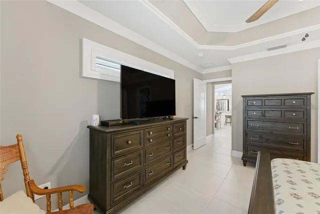 an aerial view of a house with a ocean view