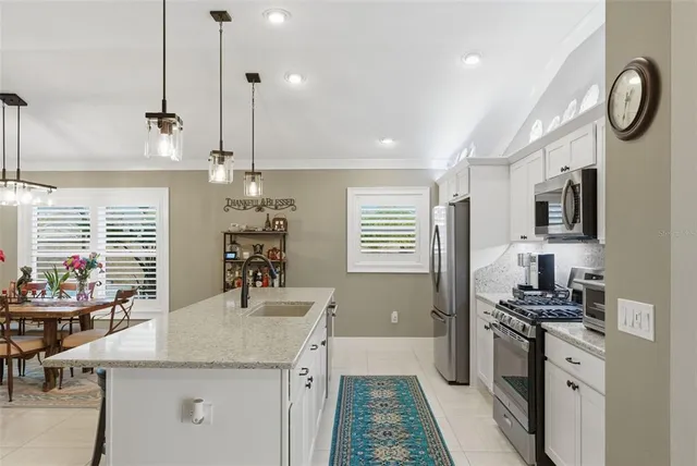 a bedroom with a bed and a walk in closet