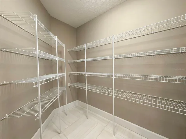 a front view of house with yard and outdoor seating