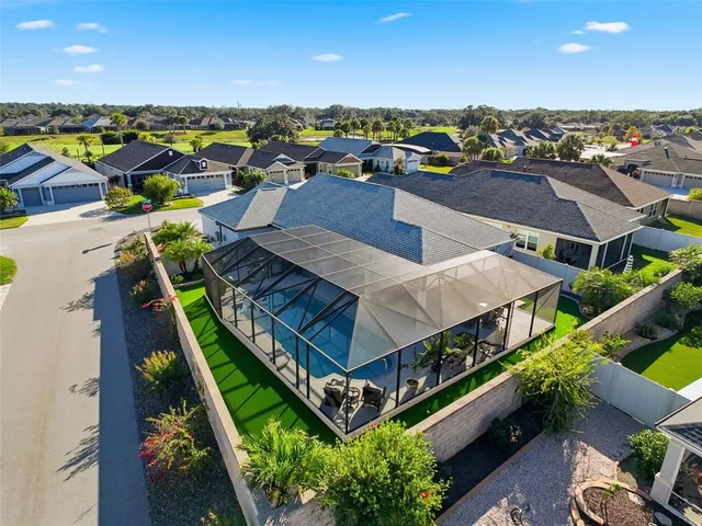 a bedroom with a large bed and a flat screen tv