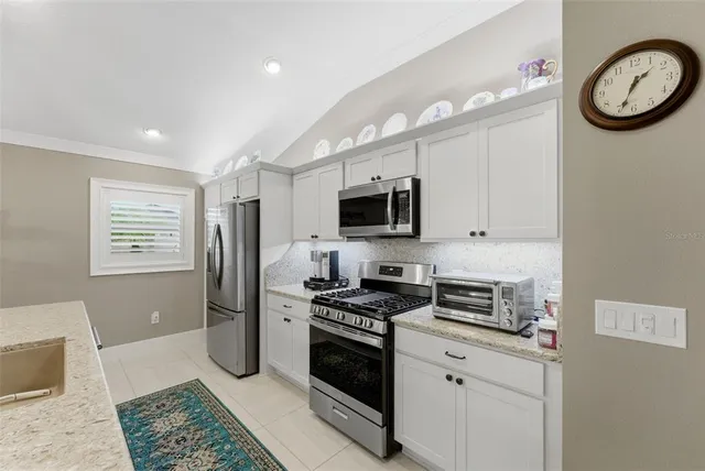 a view of parking garage with cars