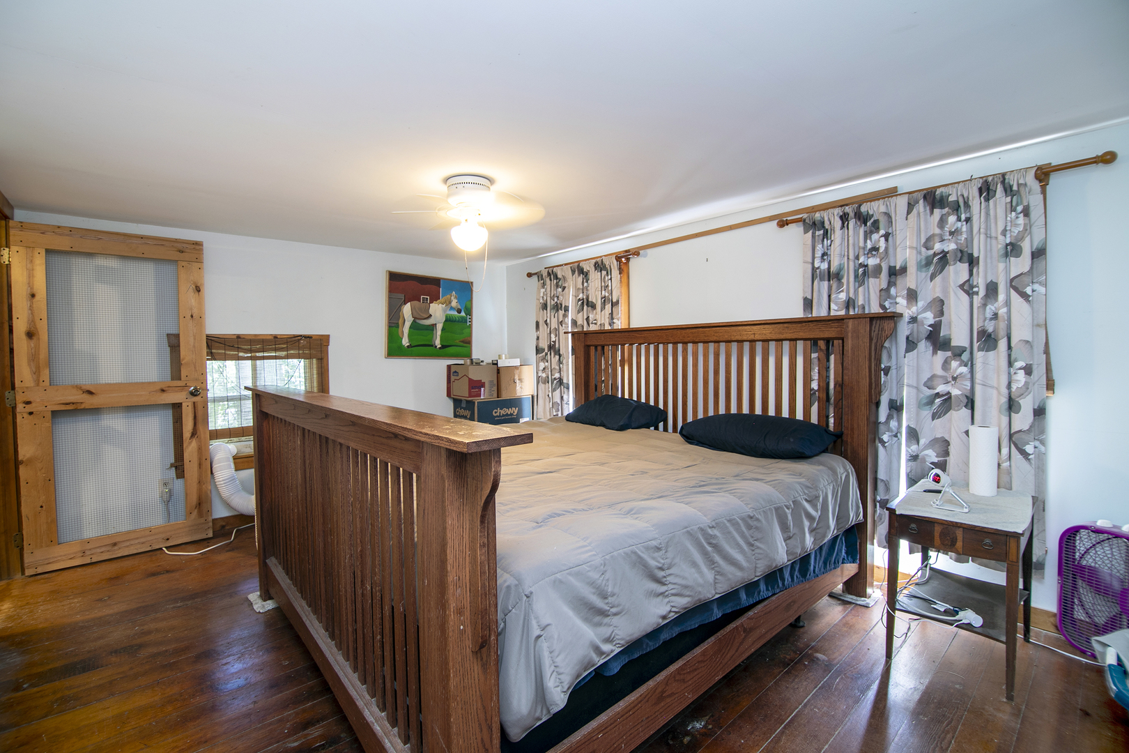 1757 East 3000 North Road Martinton, IL 60951 - Photo 14 of 33 a bedroom with a bed and wooden floor