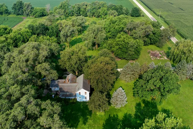 a view of a field with an ocean view