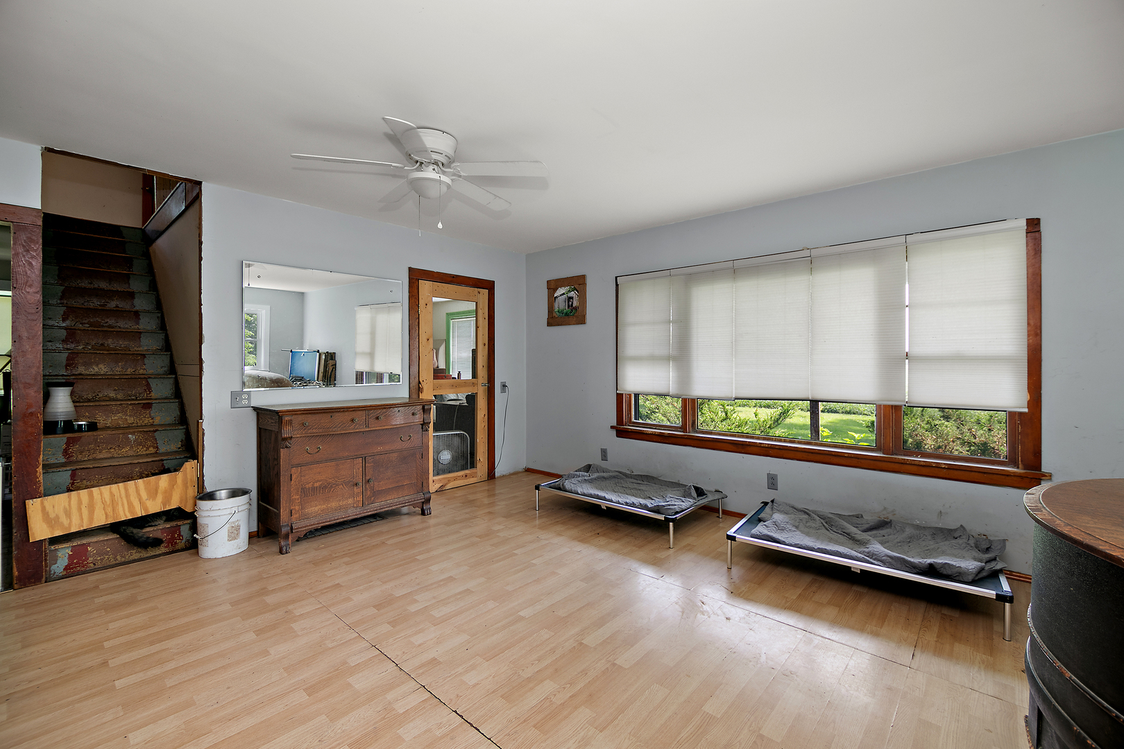 1757 East 3000 North Road Martinton, IL 60951 - Photo 5 of 33 a room with furniture and a window