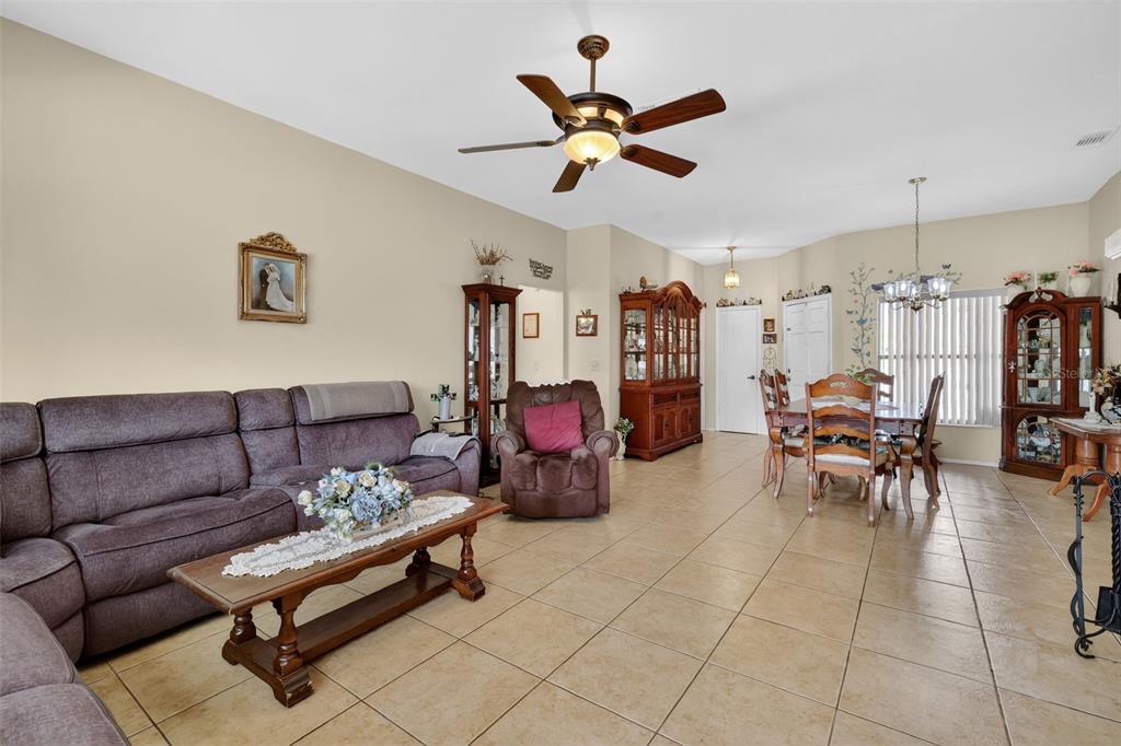 562 Hassocks Loop Lake Mary, FL 32746 - Photo 20 of 34 a living room with furniture and white walls
