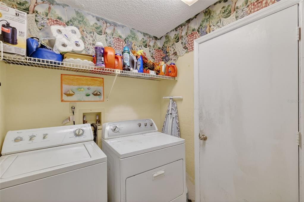 562 Hassocks Loop Lake Mary, FL 32746 - Photo 31 of 34 a utility room with dryer and washer