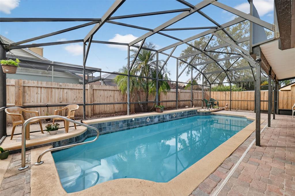 562 Hassocks Loop Lake Mary, FL 32746 - Photo 7 of 34 a view of a backyard with swimming pool