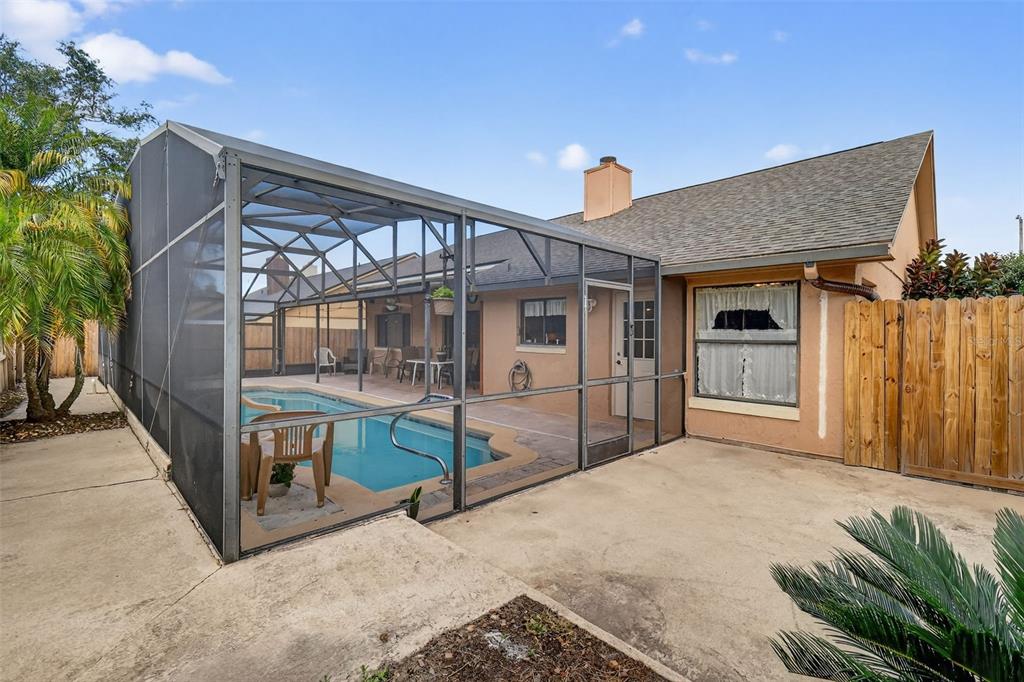 562 Hassocks Loop Lake Mary, FL 32746 - Photo 9 of 34 a view of a porch with wooden floor and fence