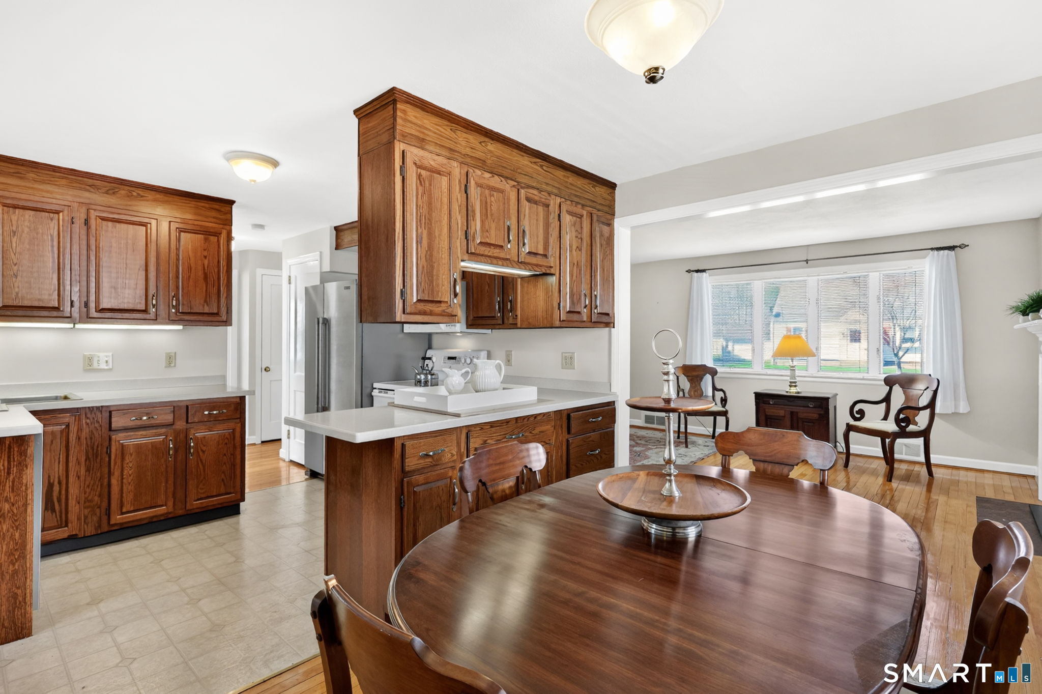 24 Madsen Road West Hartford, CT 06110 - Photo 13 of 38 a living room with stainless steel appliances granite countertop furniture a kitchen view and living room