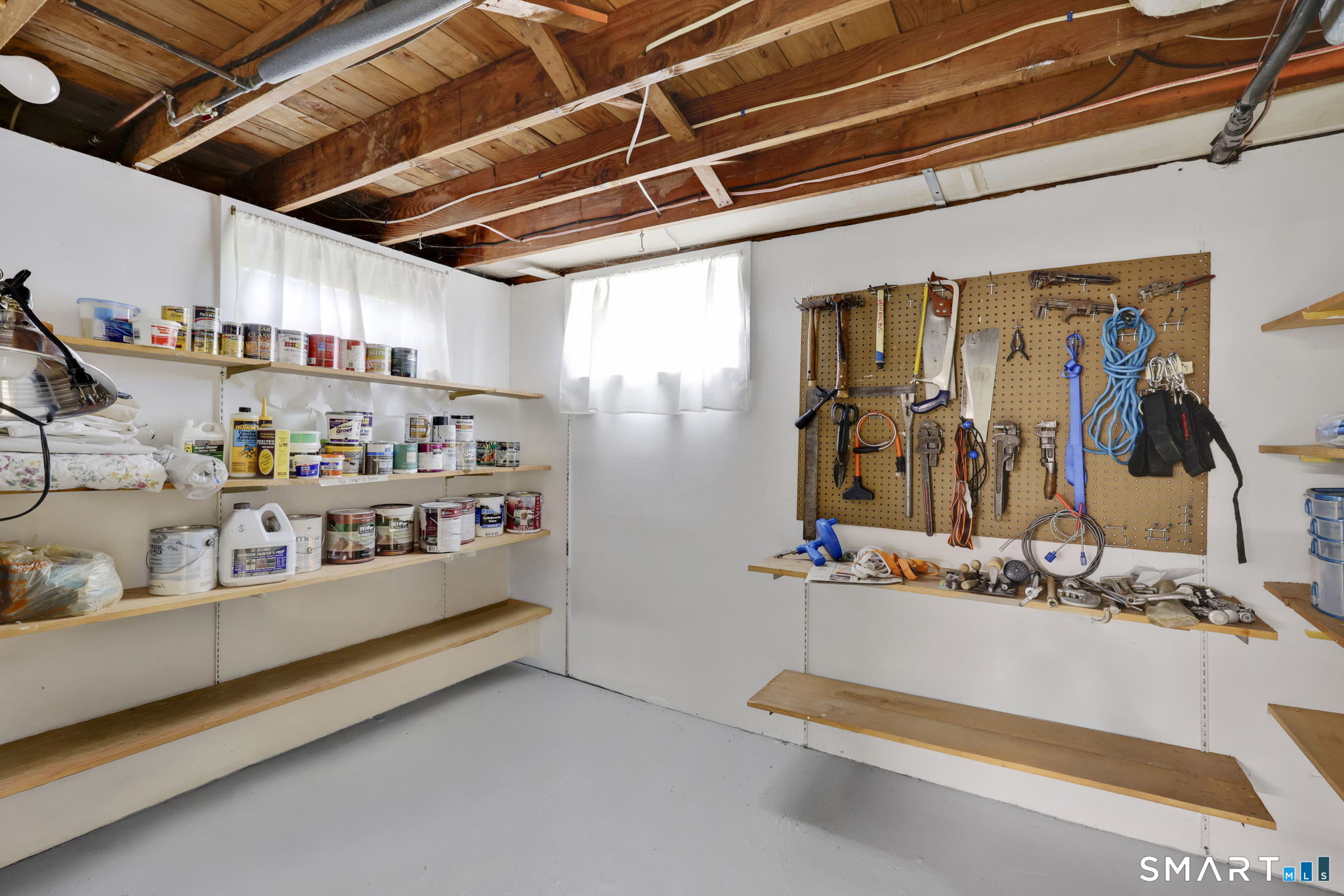 24 Madsen Road West Hartford, CT 06110 - Photo 32 of 38 a utility room with stainless steel appliances kitchen island granite countertop lots of clutter