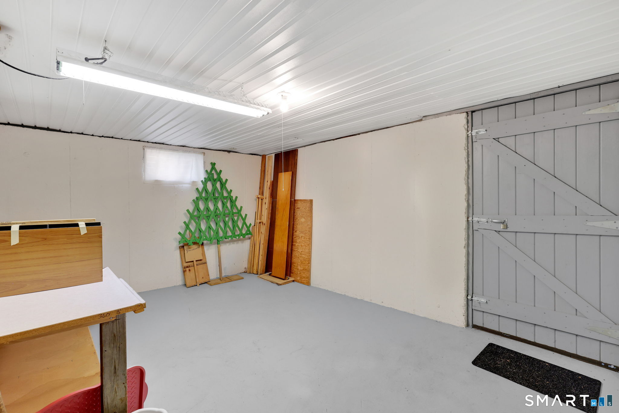 24 Madsen Road West Hartford, CT 06110 - Photo 33 of 38 a view of an empty room with a window