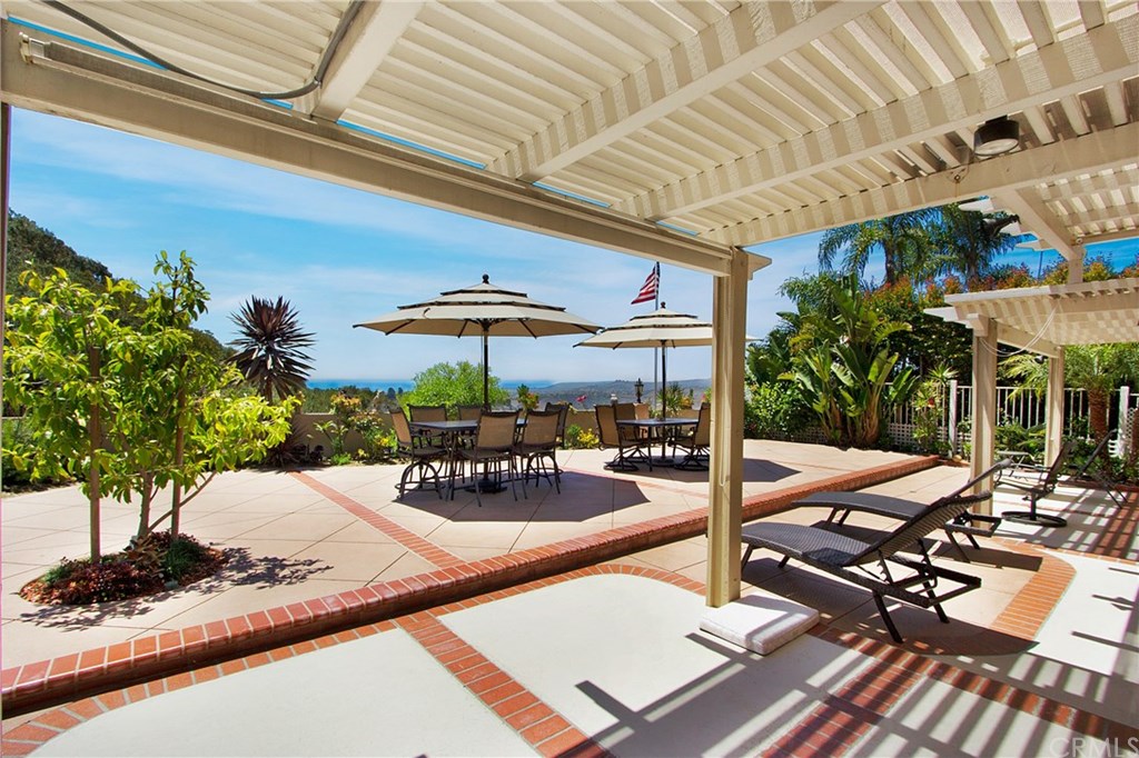 30 Santa Clara San Clemente, CA 92672 - Photo 4 of 31 Large backyard has three patio awnings for shade.
