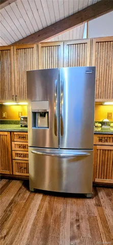 a kitchen with a stove and a sink