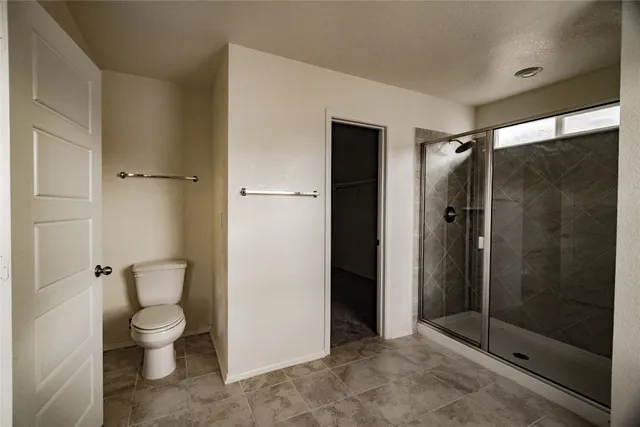 a bathroom with a double vanity sink and mirror