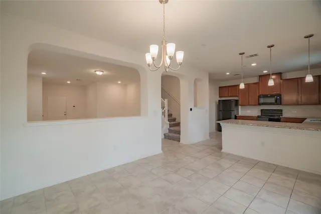 wooden floor in a room with a mirror