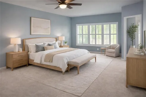 a bedroom with a bed and glass window