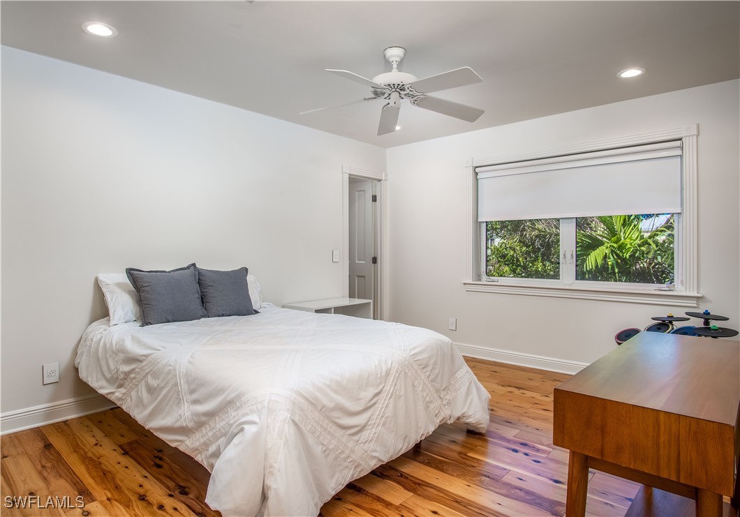 4 Coconut Drive Key West, FL 33040 - Photo 30 of 47 a bedroom with a bed and a table