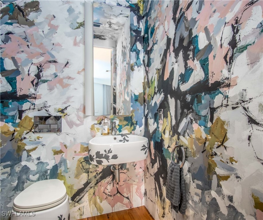 4 Coconut Drive Key West, FL 33040 - Photo 42 of 47 a bathroom with a sink and toilet