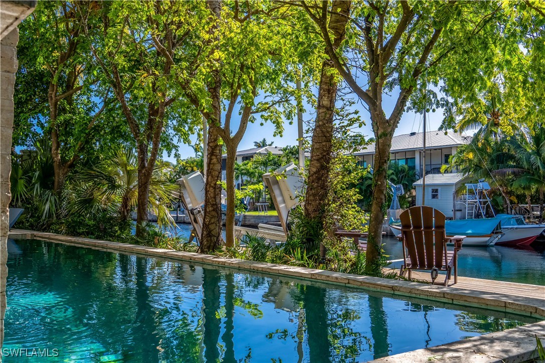 4 Coconut Drive Key West, FL 33040 - Photo 47 of 47 a balcony with trees in front of it