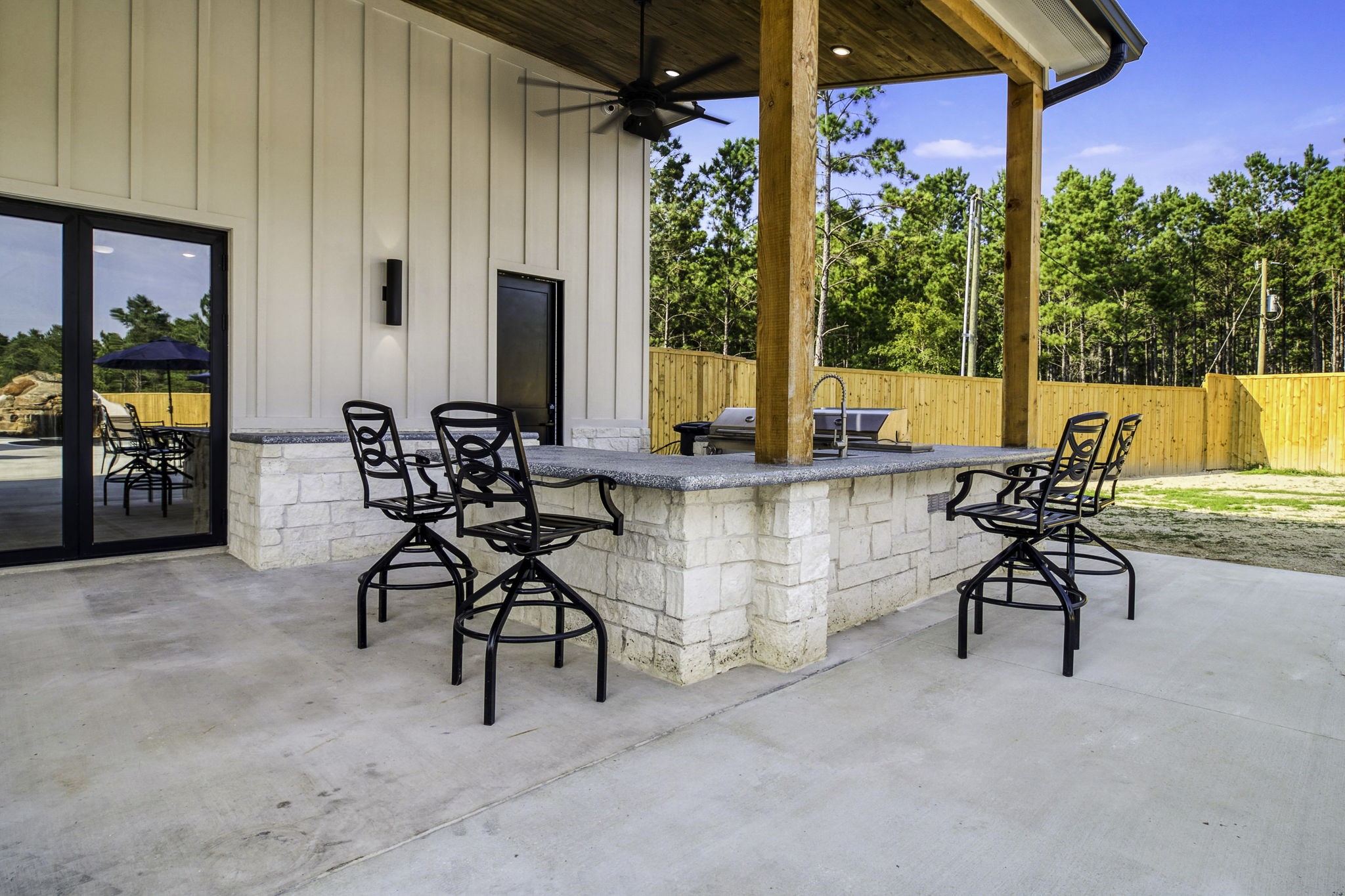4602 Fm 3459 Road Onalaska, TX 77360 - Photo 36 of 45 a building outdoor space with patio furniture and potted plants
