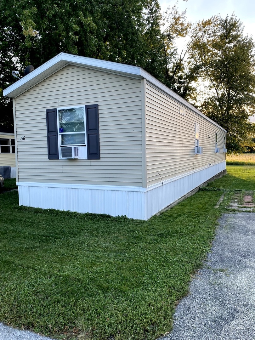 36 Cedar Street Minooka, IL 60447 - Photo 1 of 12 a view of a house with backyard