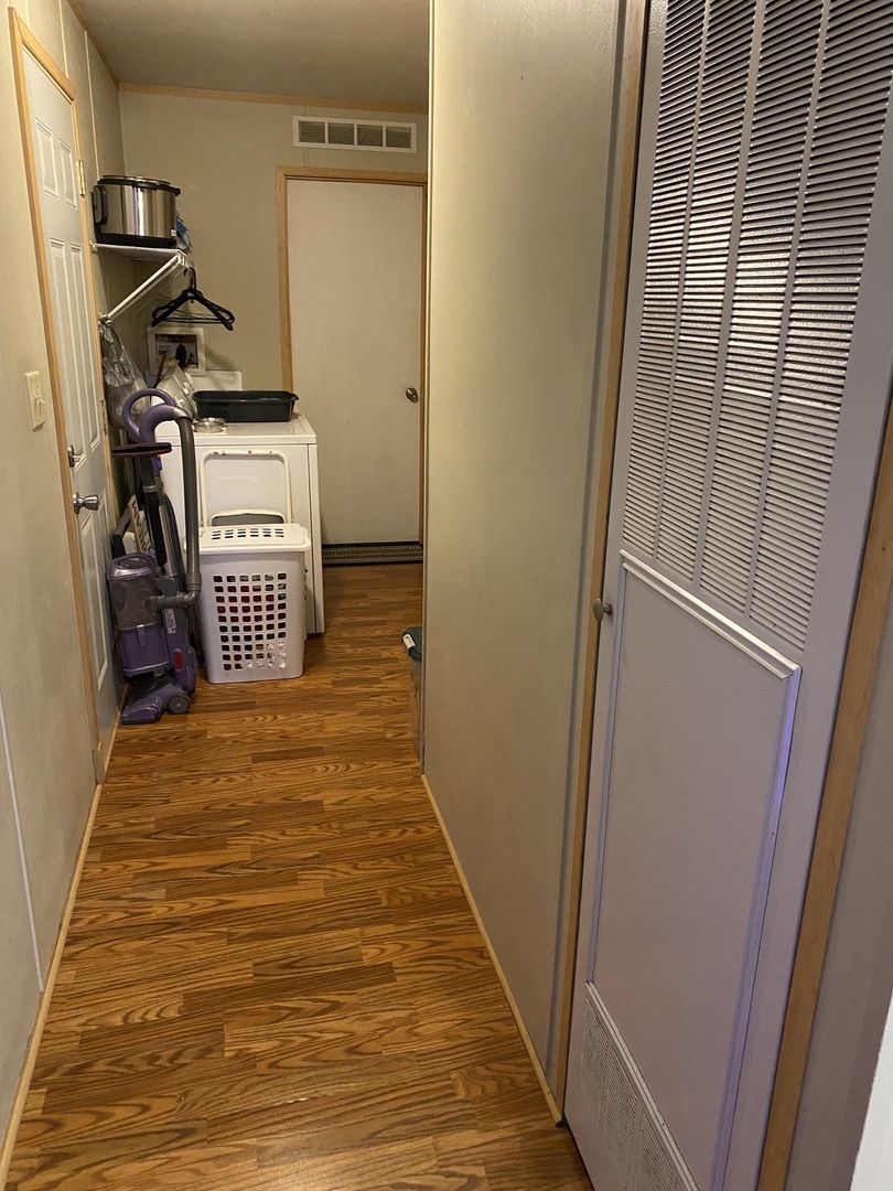 36 Cedar Street Minooka, IL 60447 - Photo 5 of 12 a room with wooden floor washer and dryer