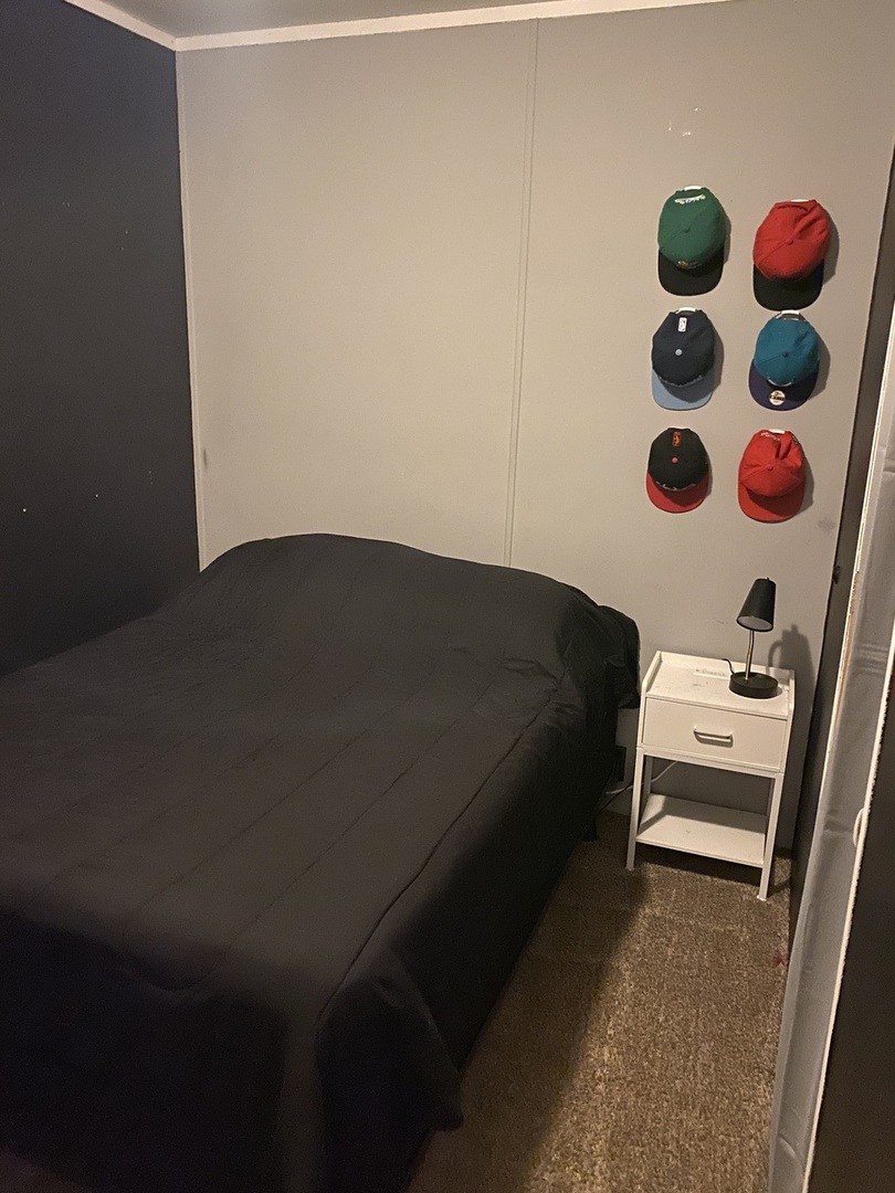 36 Cedar Street Minooka, IL 60447 - Photo 8 of 12 a bedroom with a bed and a cabinets