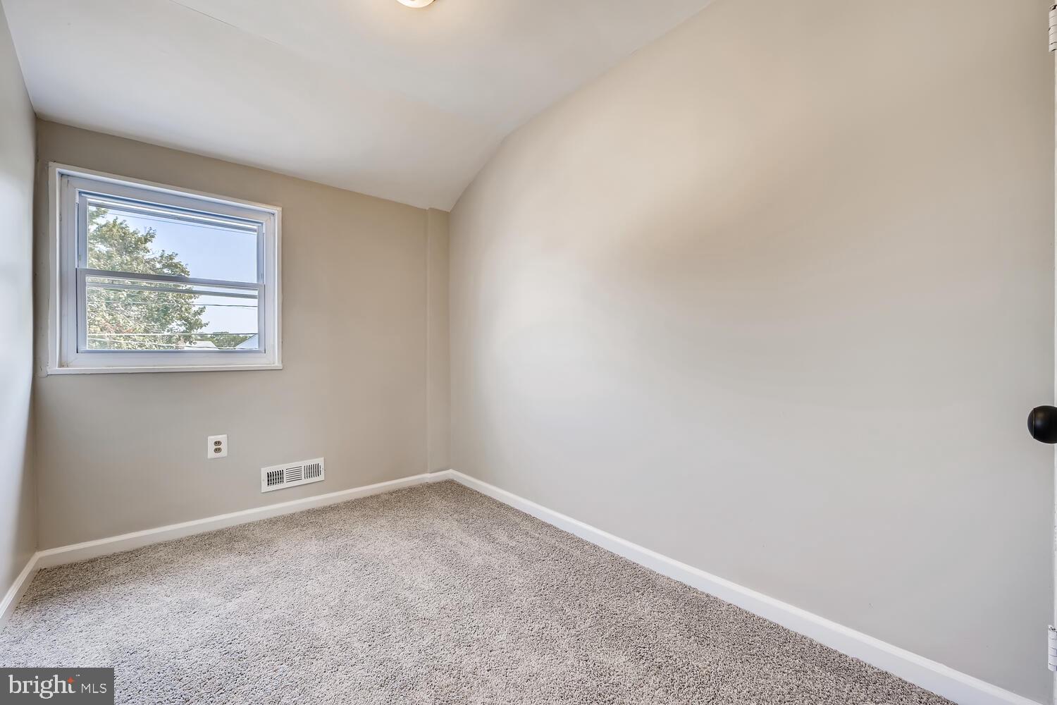 2720 Moorgate Road Baltimore, MD 21222 - Photo 18 of 28 an empty room with a window
