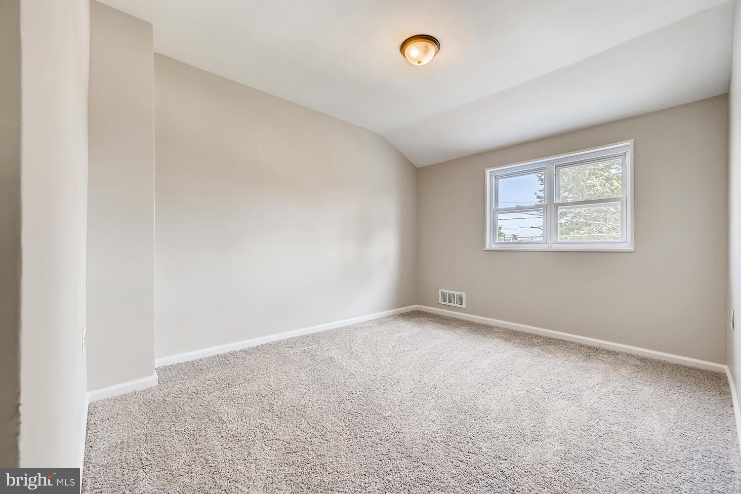 2720 Moorgate Road Baltimore, MD 21222 - Photo 19 of 28 an empty room with windows