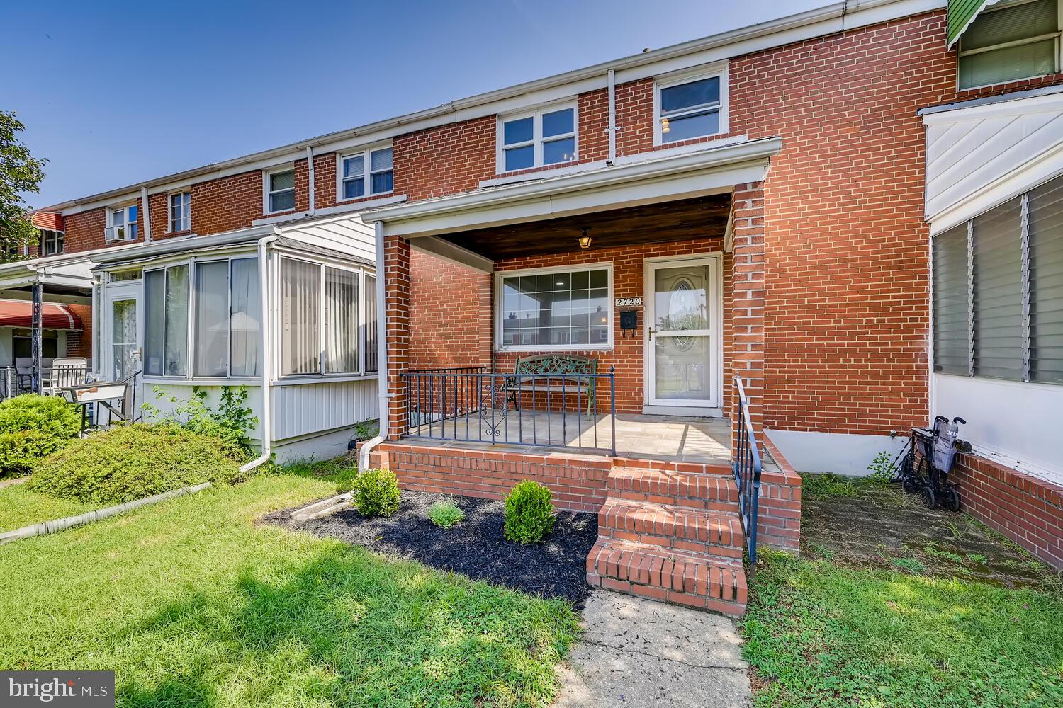 2720 Moorgate Road Baltimore, MD 21222 - Photo 3 of 28 a front view of a house with garden