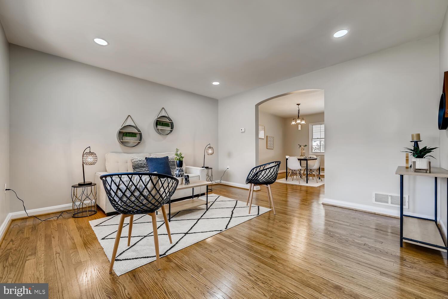 2720 Moorgate Road Baltimore, MD 21222 - Photo 5 of 28 a living room with furniture and a wooden floor