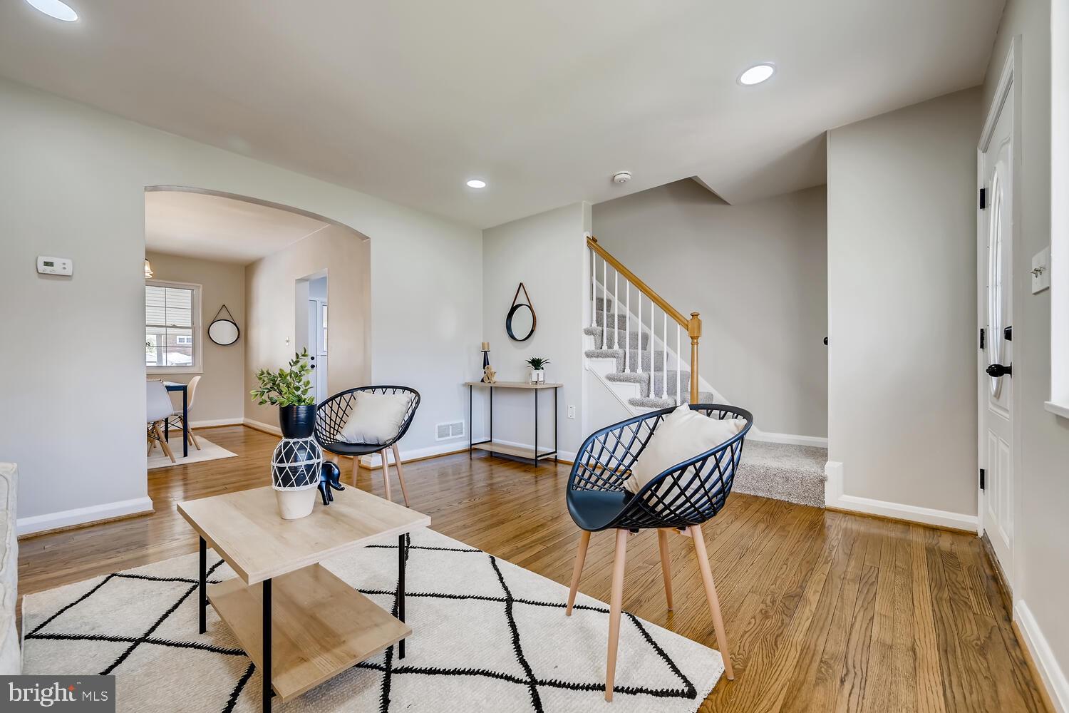 2720 Moorgate Road Baltimore, MD 21222 - Photo 7 of 28 a living room with furniture and wooden floor