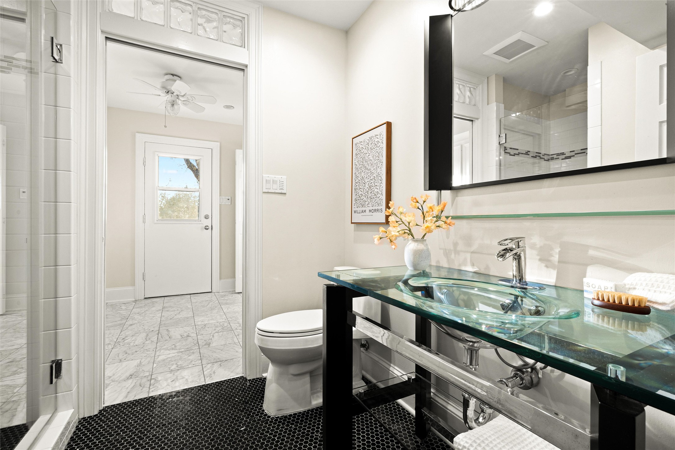 5301 Valburn Circle Austin, TX 78731 - Photo 13 of 39 a bathroom with a sink and a mirror