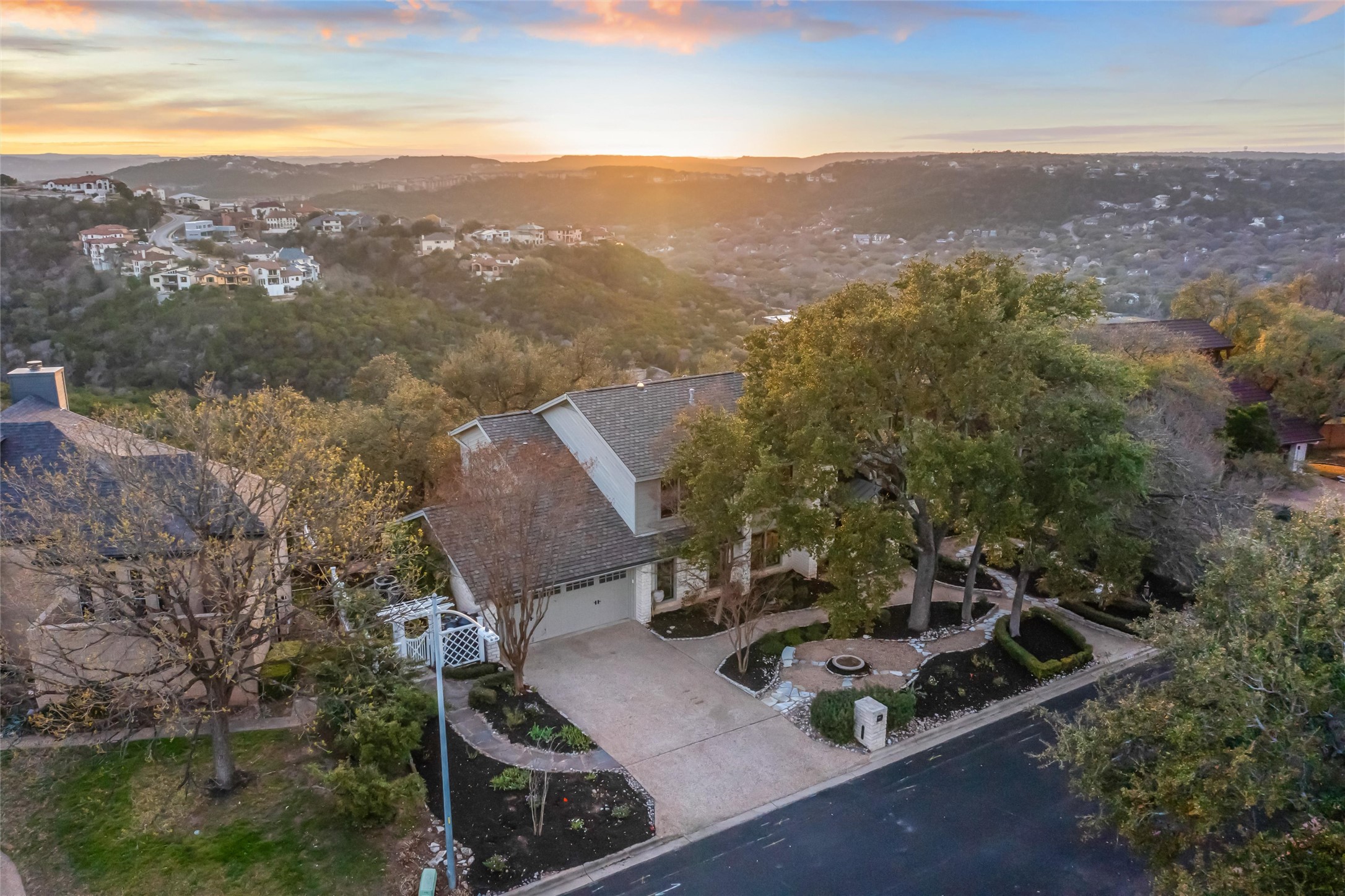 5301 Valburn Circle Austin, TX 78731 - Photo 34 of 39 a view of a house with a yard and lake view