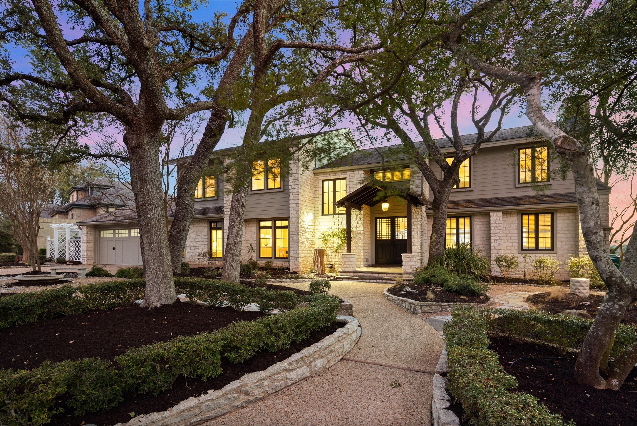 5301 Valburn Circle Austin, TX 78731 - Photo 4 of 39 a front view of a house with yard and green space