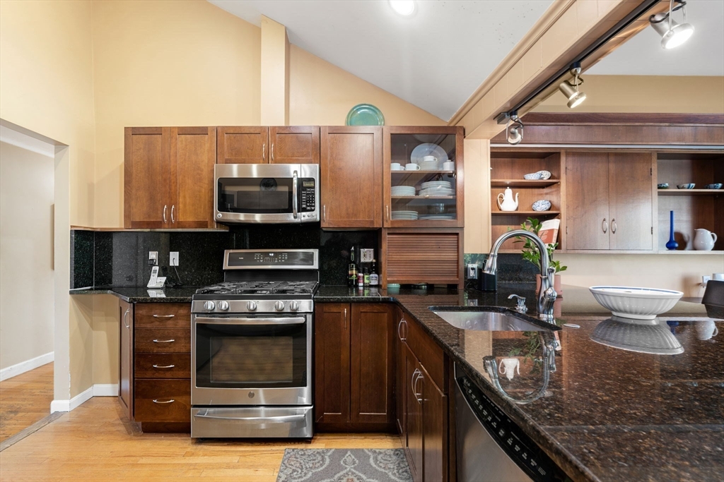 42 Stanley Road Newton, MA 02468 - Photo 5 of 29 a kitchen with a stove and a sink