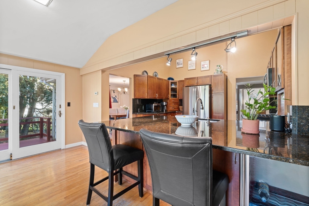 42 Stanley Road Newton, MA 02468 - Photo 6 of 29 a kitchen with a table chairs and entryway