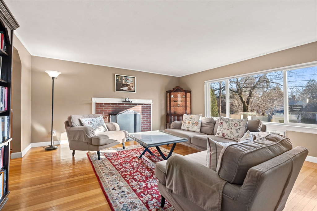 42 Stanley Road Newton, MA 02468 - Photo 8 of 29 a living room with furniture and a floor to ceiling window