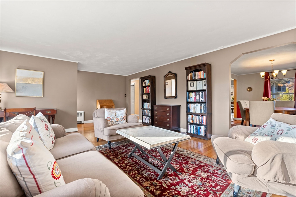 42 Stanley Road Newton, MA 02468 - Photo 10 of 29 a living room with furniture a rug and a table