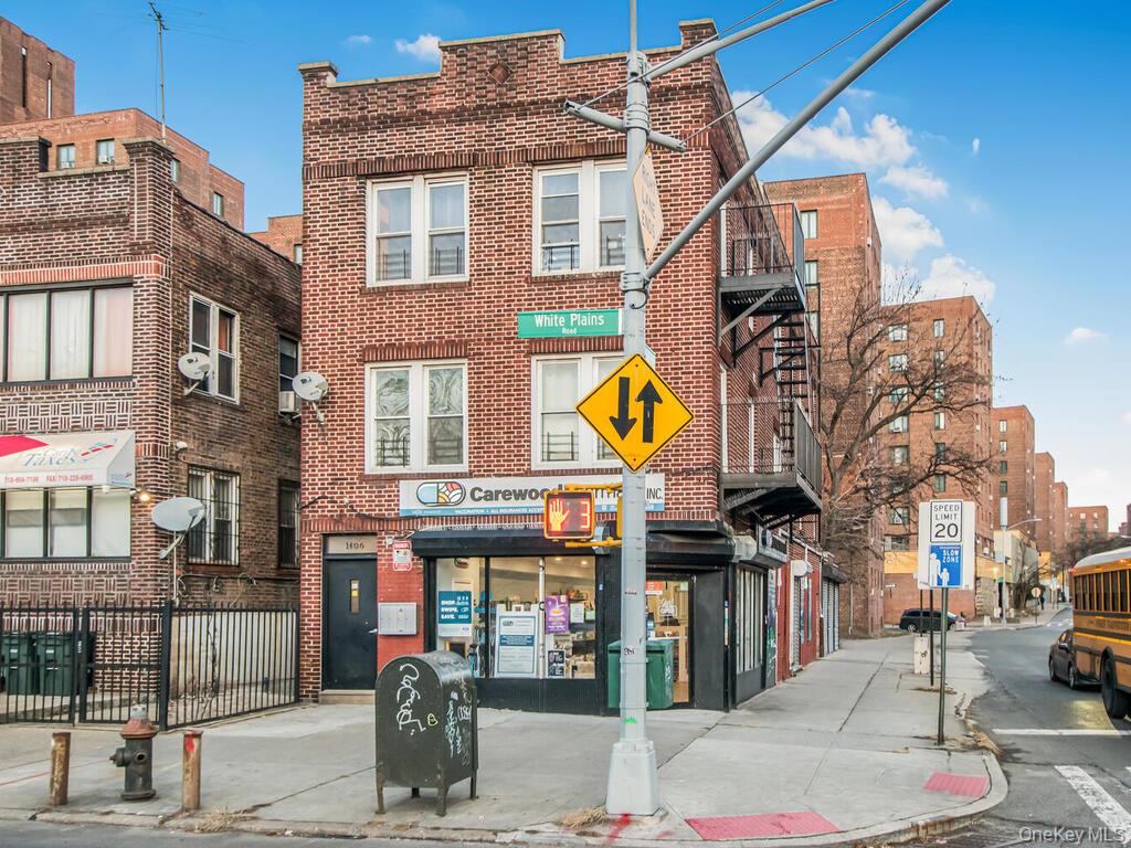 1406 White Plains Road Bronx, NY 10462 - Photo 3 of 43 a front view of a building with street
