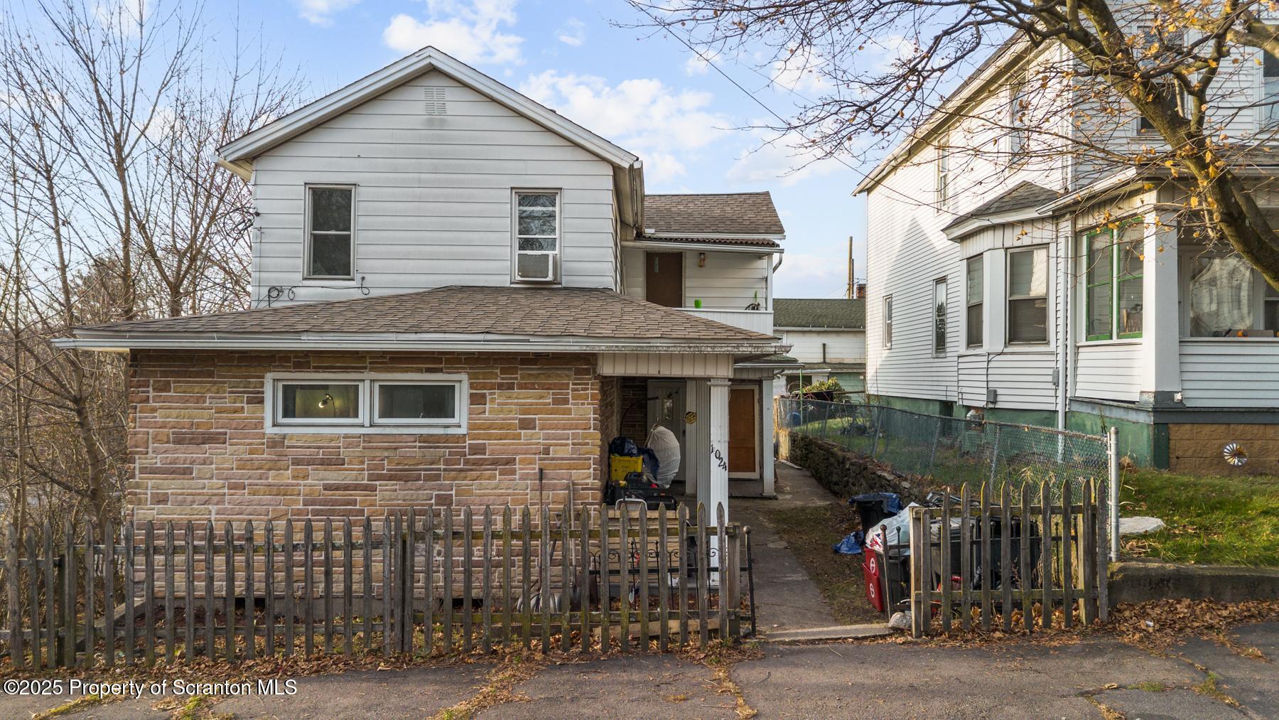 1024 South Webster Avenue Scranton, PA 18505 - Photo 1 of 38 a front view of a house