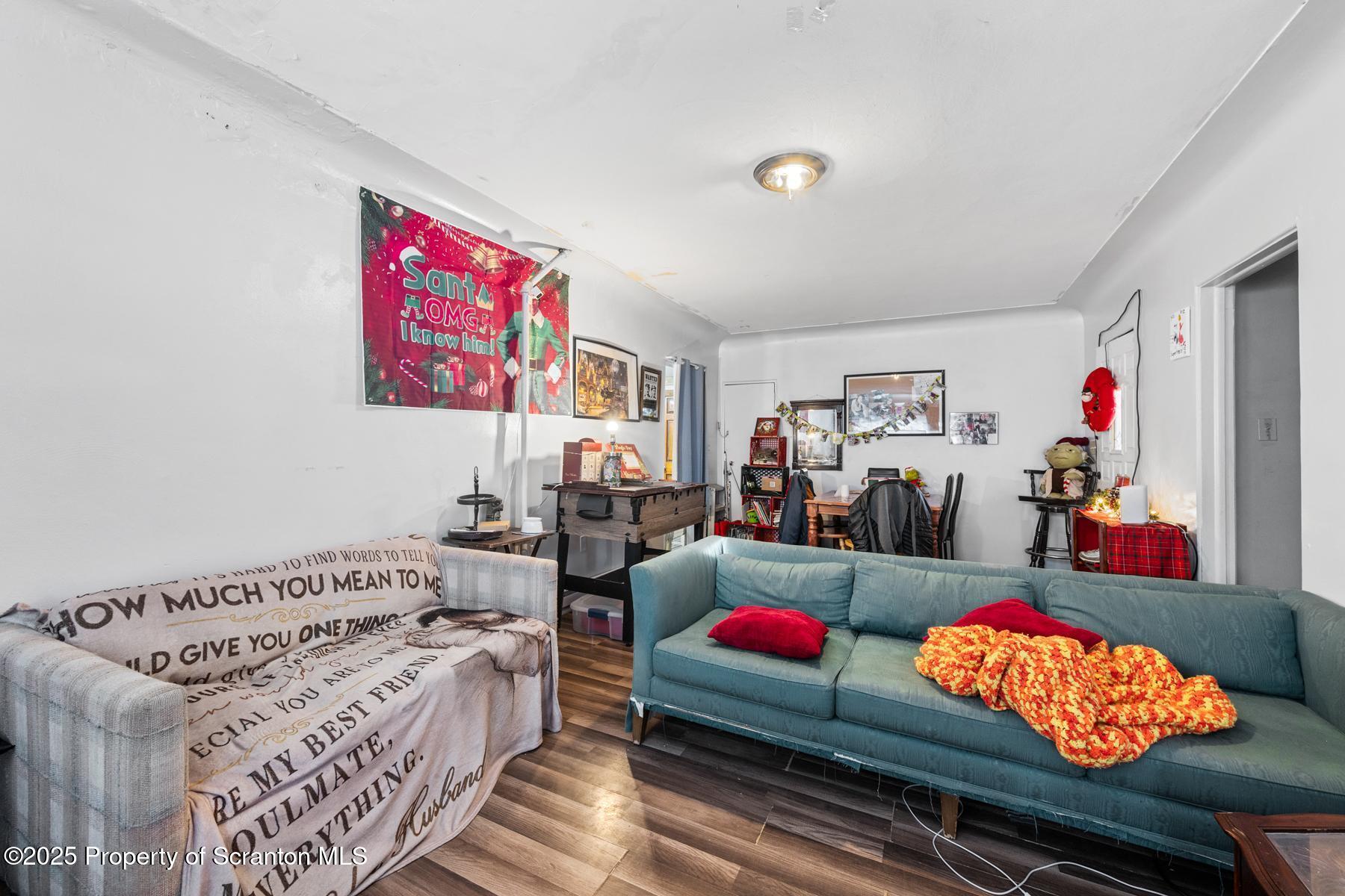 1024 South Webster Avenue Scranton, PA 18505 - Photo 16 of 38 a bedroom with furniture and a couch