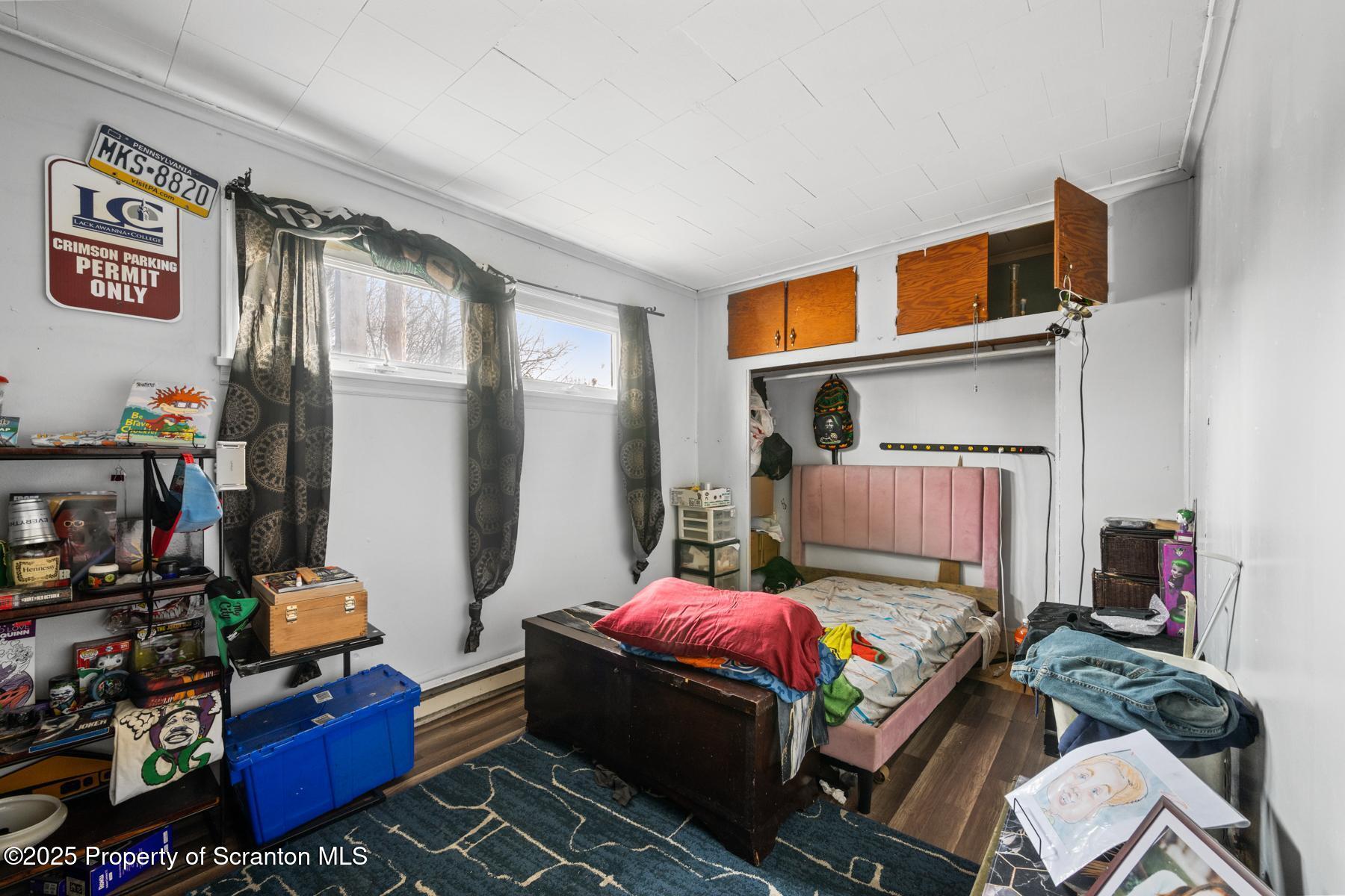 1024 South Webster Avenue Scranton, PA 18505 - Photo 34 of 38 a bedroom with furniture and a large window