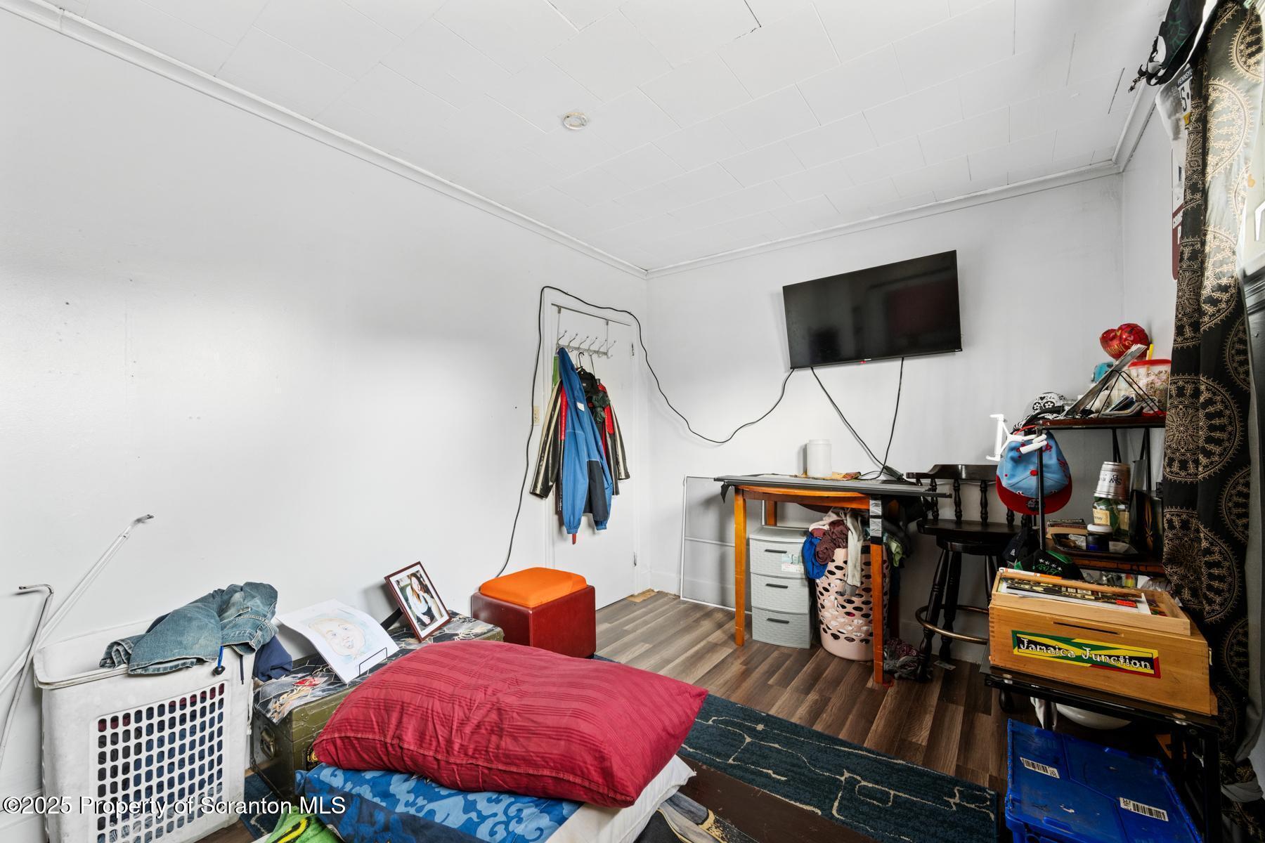 1024 South Webster Avenue Scranton, PA 18505 - Photo 35 of 38 a living room with furniture and a flat screen tv