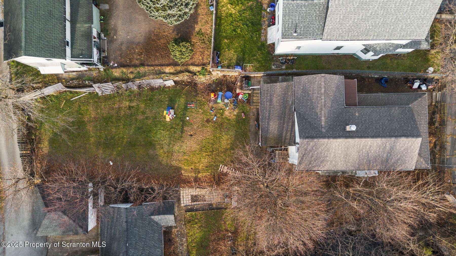 1024 South Webster Avenue Scranton, PA 18505 - Photo 6 of 38 a view of a house with a yard