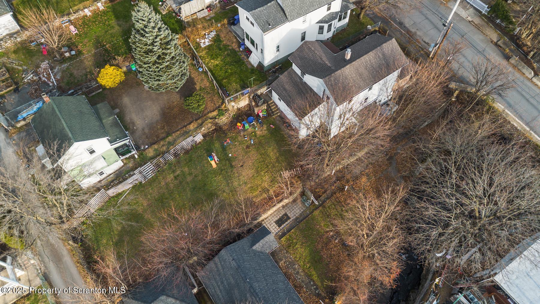 1024 South Webster Avenue Scranton, PA 18505 - Photo 7 of 38 view of a house with a yard